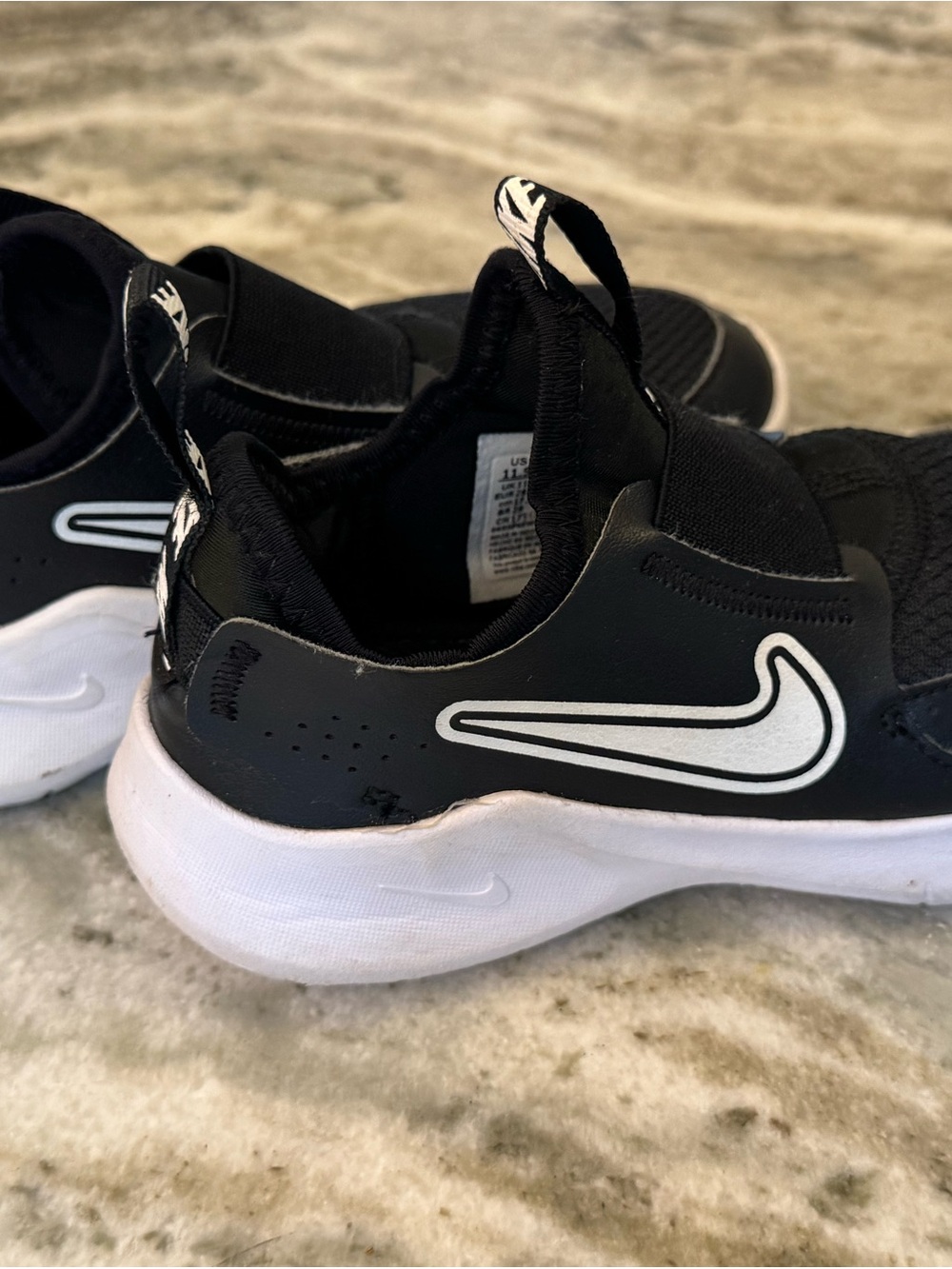 Nike Kids Black and White Slip-On Sneakers